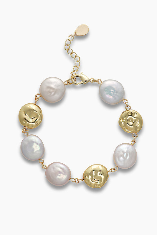 Léa bracelet with white freshwater pearls and golden metal beads